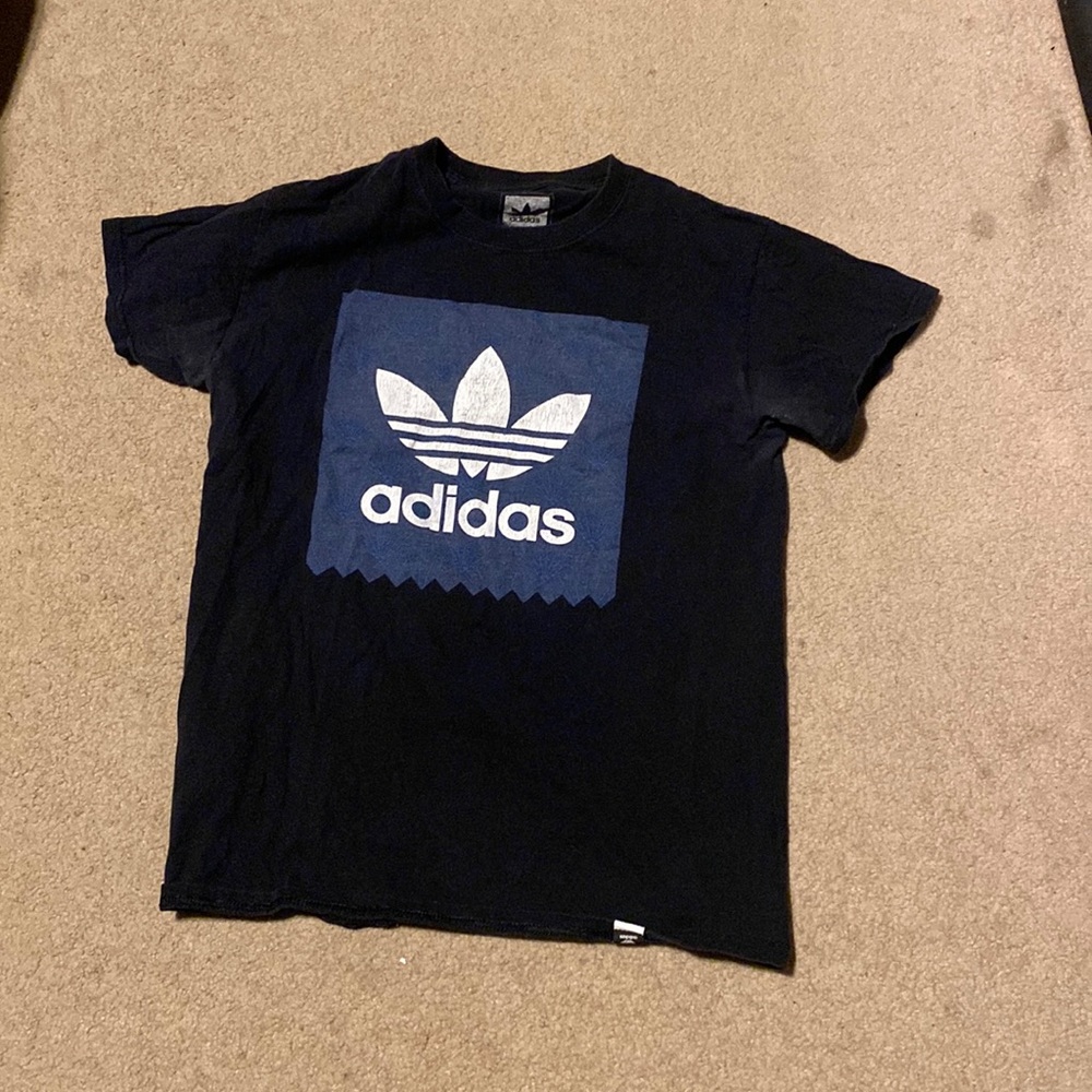 Navy blue and baby blue colored Adidas shirt